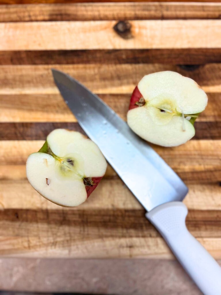 Fresh apples and spices laid out for making slow cooker homemade apple butter