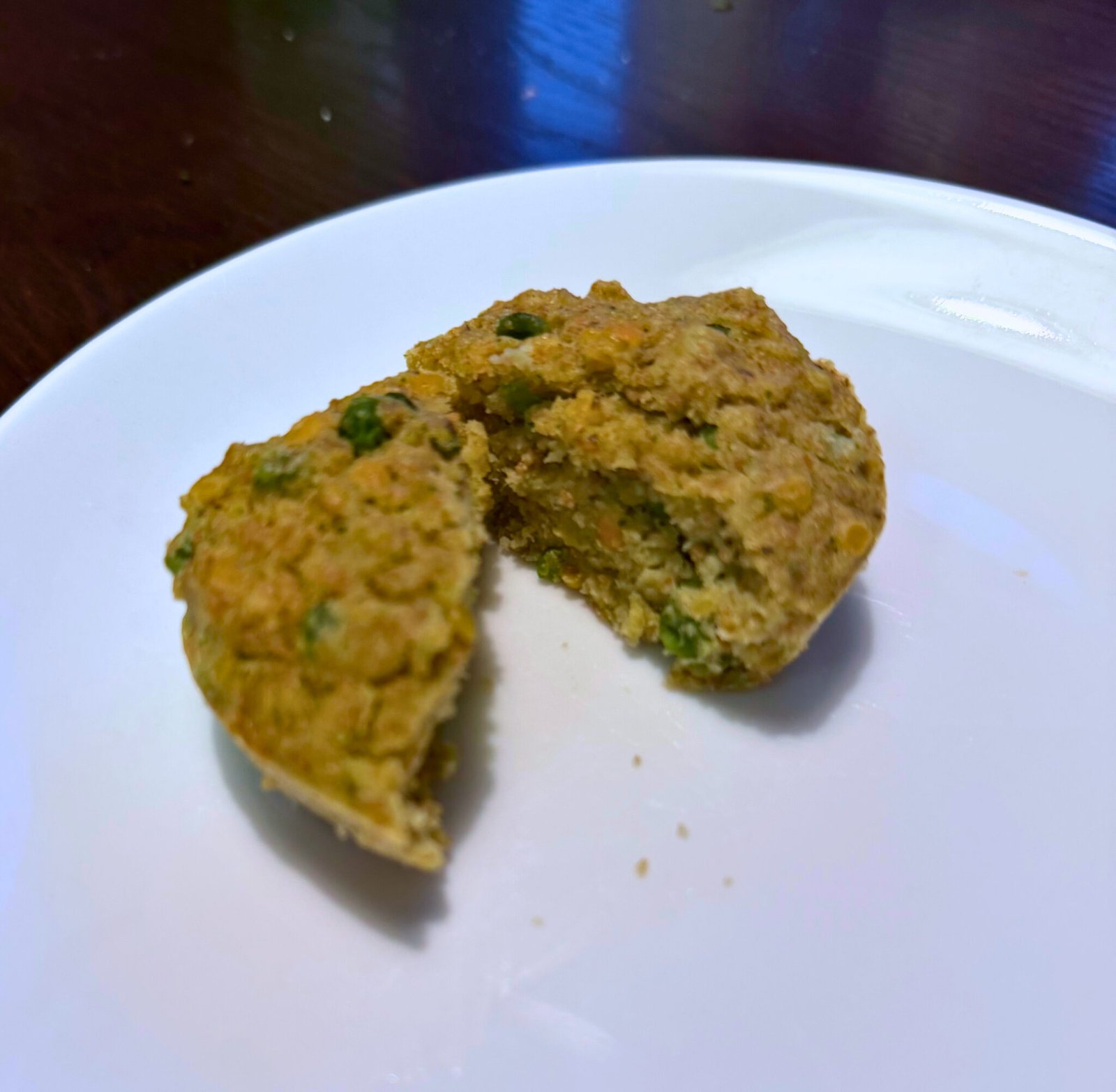 Lentil veggie cups cooling on a rack, baked golden and ready to serve