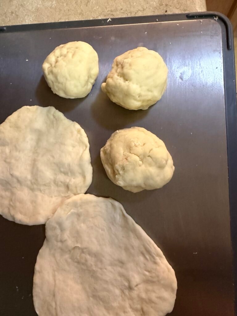 Sourdough discard naan ingredients including flour, Greek yogurt, and olive oil