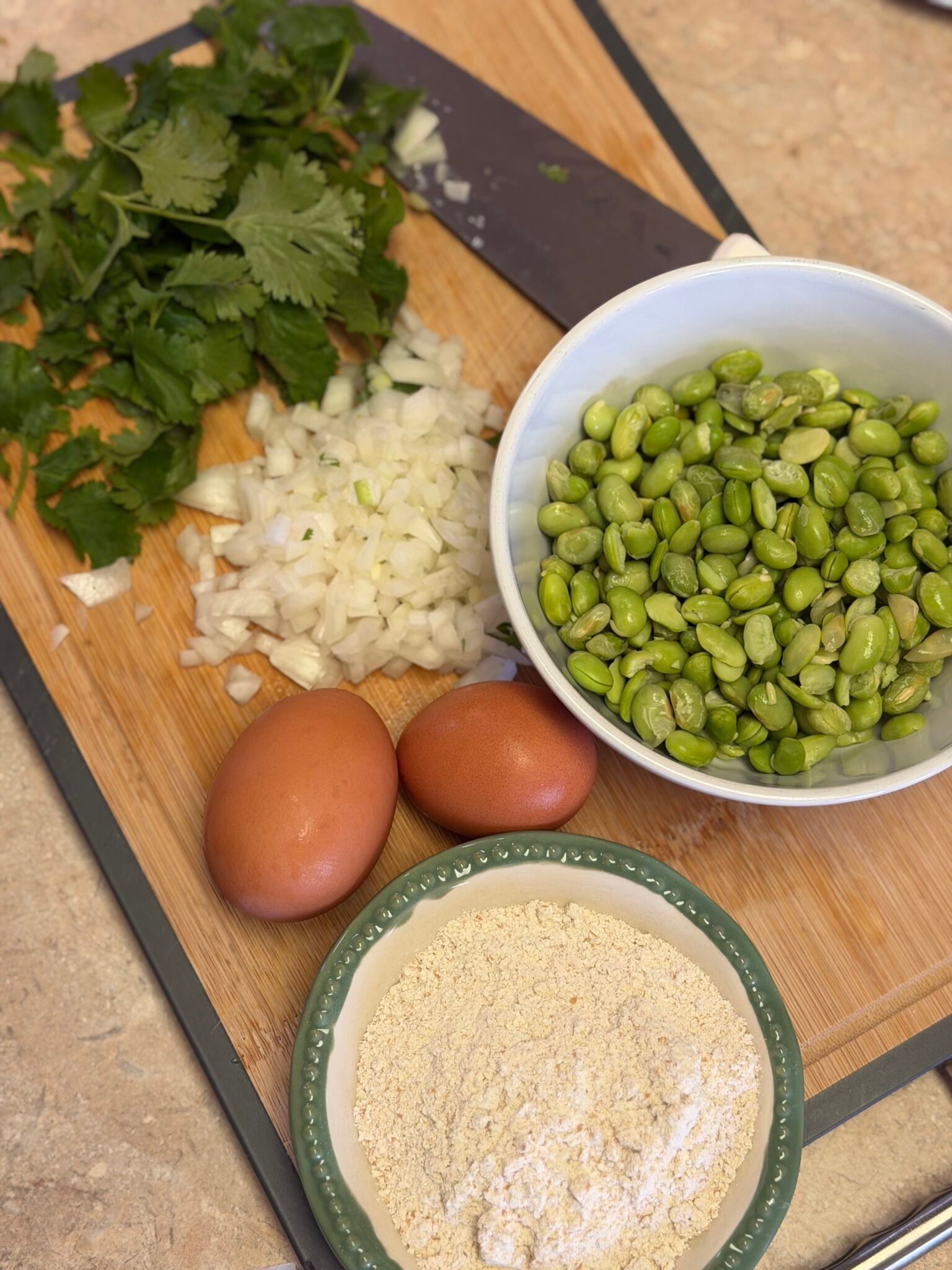 Edamame fritter batter in food processor, blended smooth and ready to cook